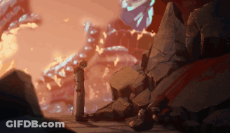 Man Statue In Front Of Large Rock Formation GIF