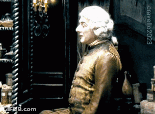 Man Statue Sitting By Door 2023 GIF