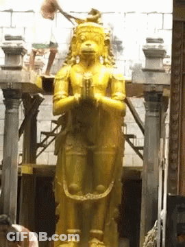 Man Statue With Monkey On Head In Temple GIF