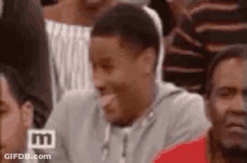 Man Sticking Tongue Out At Stadium GIF