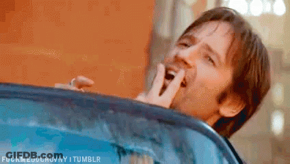 Man Sticking Tongue Out Car Window GIF
