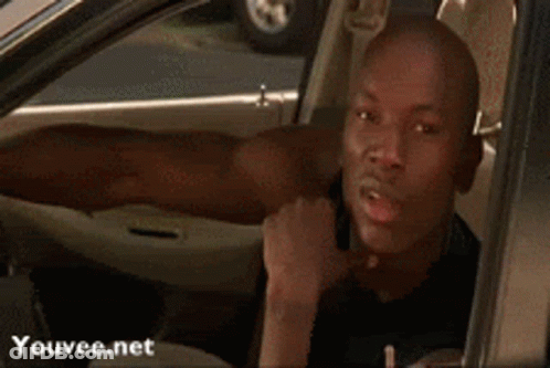 Man Sticking Tongue Out In Car GIF