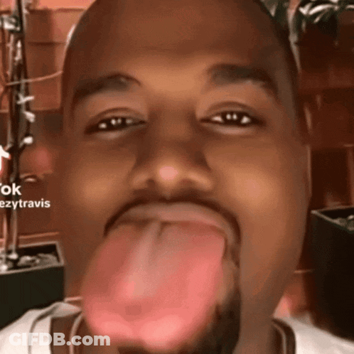 Man Sticking Tongue Out Saying Ezytravis GIF