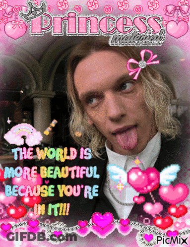 Man Sticking Tongue Out Saying World Is More Beautiful Because You're In It GIF