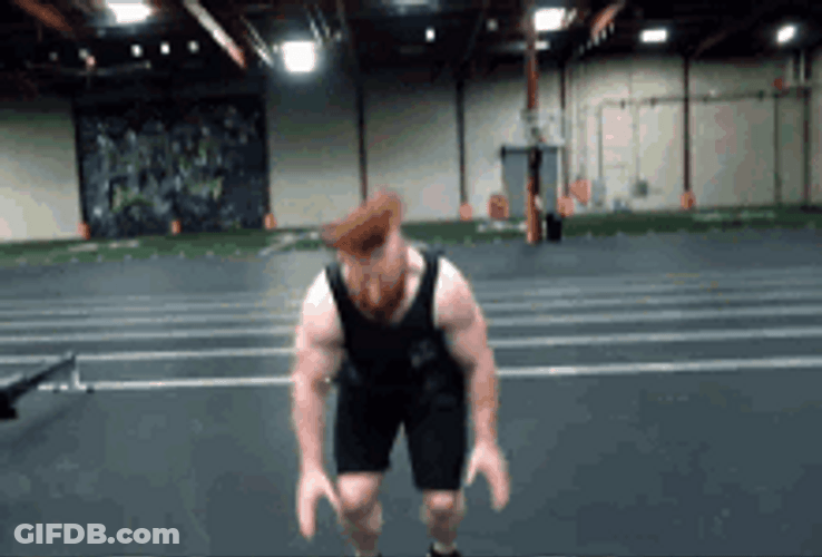 Man Strength Training Doing Burpee Exercise GIF