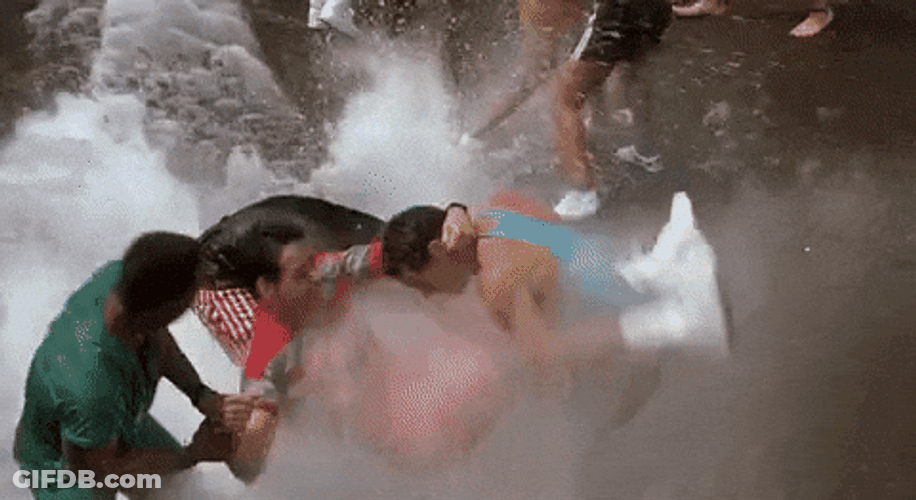 Man Struggle To Breath Being Splash By Fire Hose GIF