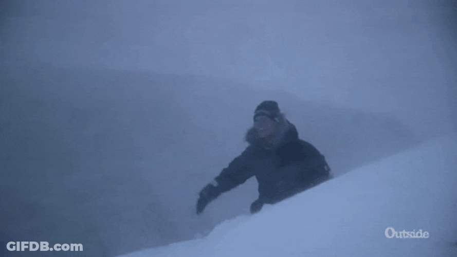 Man Struggling To Walk In Snow Storm GIF