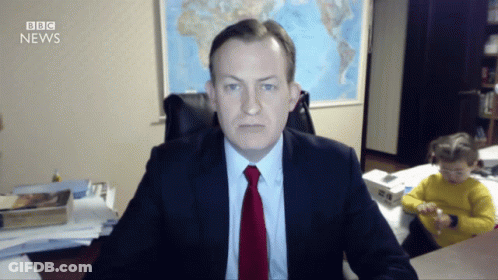 Man Suit And Tie At BBC News Sign GIF