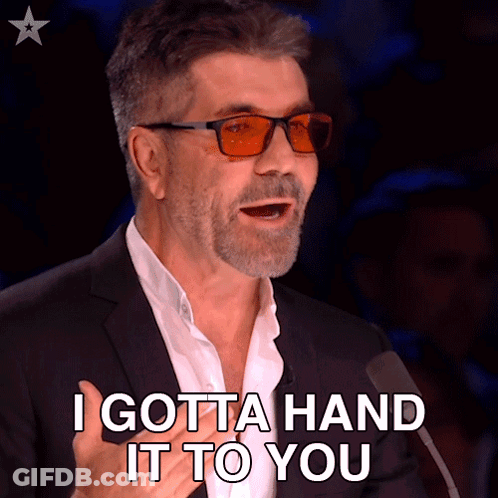 Man Suit Glasses Says I Gotta Hand It To You GIF