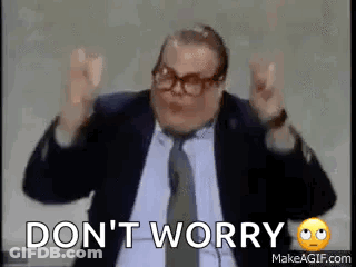 Man Suit Making Funny Face Saying Don't Worry GIF