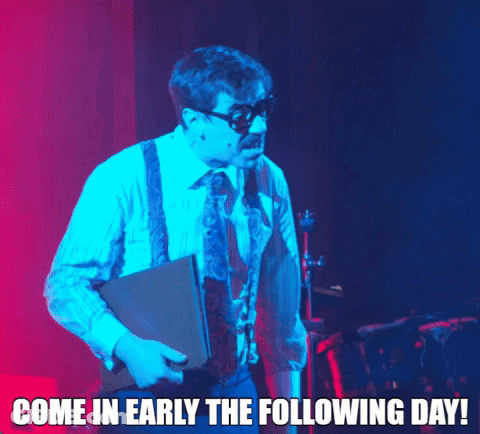Man Suit Suspenders Holding Book Come In Early GIF