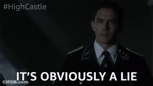 Man Suit Tie Eyes Closed Says Obviously Lie GIF