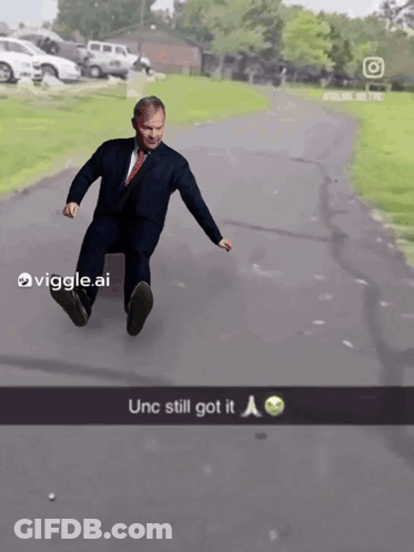 Man Suit Tie Skateboard Unc Still Got It GIF