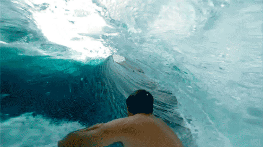 Man Surfing Inside Big Waves GIF