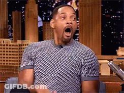 Man Surprised At Microphone With Mouth Open GIF