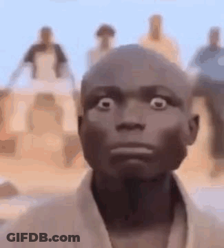 Man Surprised In Front Of Crowd GIF