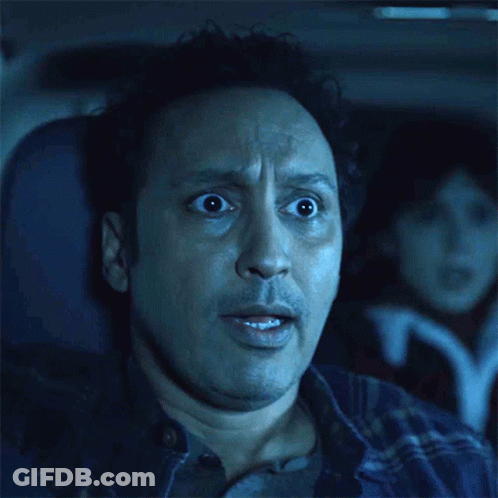 Man Surprised Sitting In Car GIF