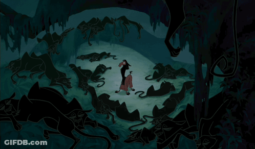 Man Surrounded By Black Animals GIF
