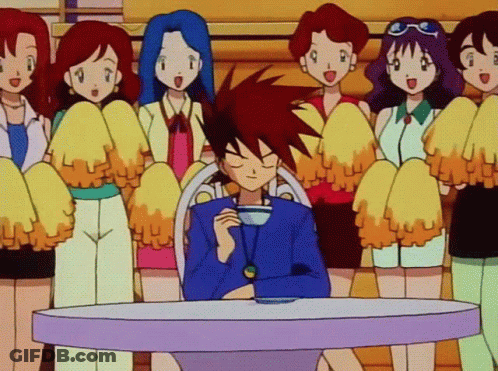 Man Surrounded By Cheerleaders Holding Pom Poms GIF