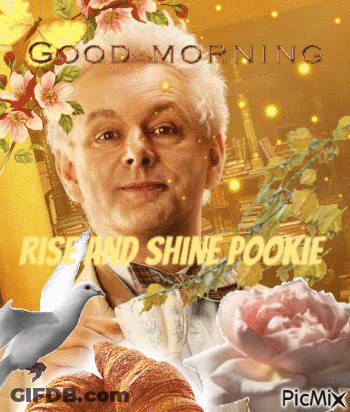 Man Surrounded By Flowers And Croissants GIF