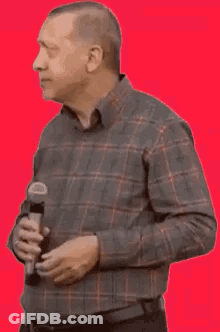 Man Surrounded By Gold Balloons Rom Rom GIF