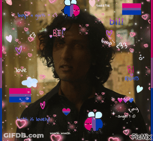 Man Surrounded By Pink And Blue Hearts Saying Love GIF