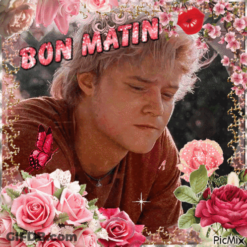 Man Surrounded By Pink Flowers Bon Matin GIF