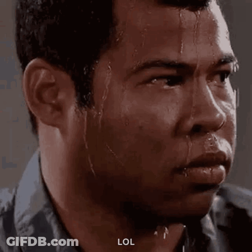 Man Sweating Looking At Camera GIF