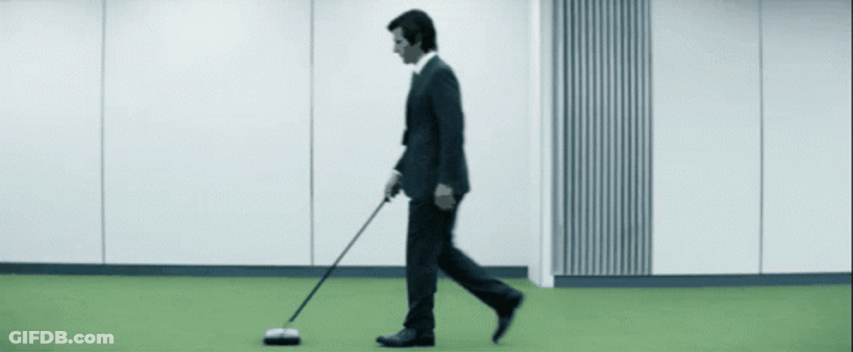 Man Sweep The Ground In The Backyard GIF