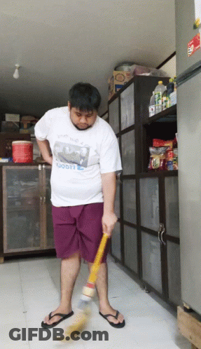 Man Sweeping Floor In White Scooter Shirt GIF