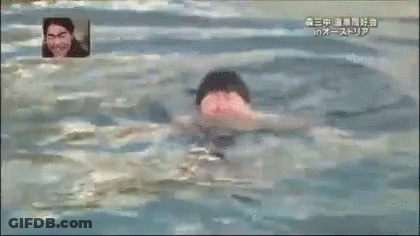 Man Swimming In Pool With Picture Behind Him GIF
