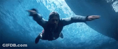 Man Swimming Through Air Over Ocean GIF