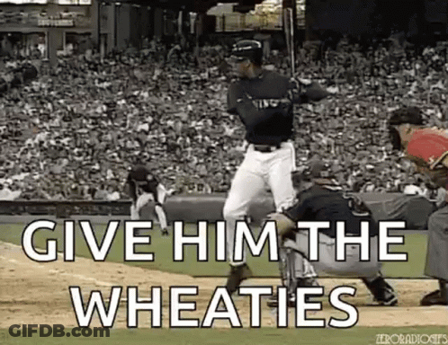 Man Swinging Baseball Bat At Ball GIF