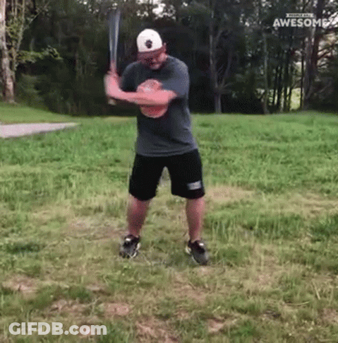 Man Swinging Baseball Bat Saying Awesome GIF