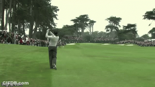 Man Swinging Golf Club GIF