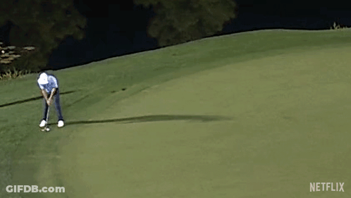 Man Swinging Golf Club GIF