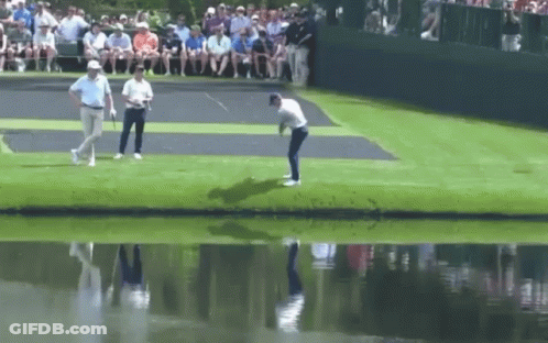 Man Swinging Golf Club GIF