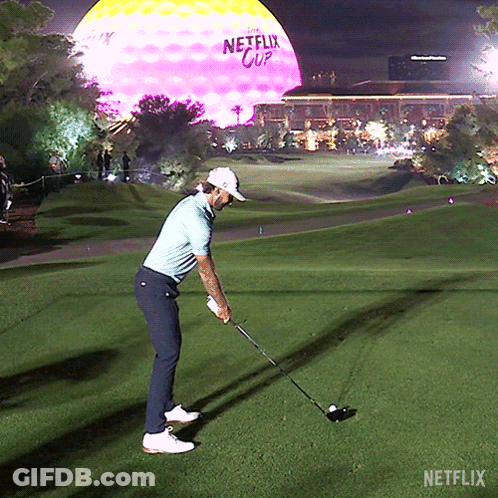 Man Swinging Golf Club GIF