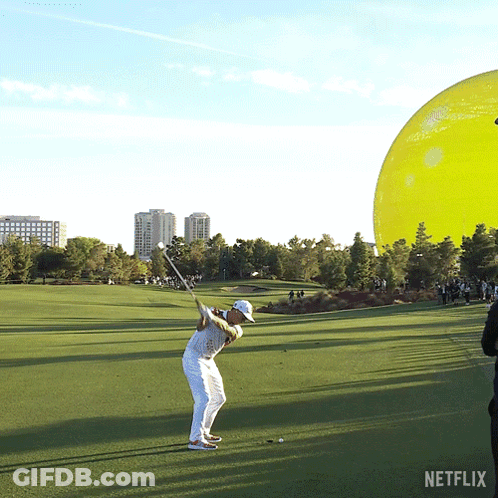 Man Swinging Golf Club GIF