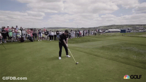 Man Swinging Golf Club On Course GIF