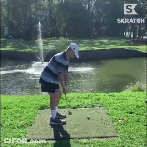 Man Swinging Golf Club With Fountain GIF