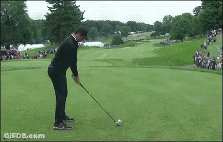 Man Swinging Golf Club GIF