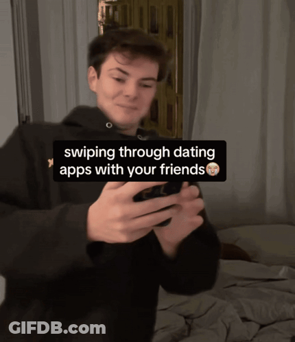 Man Swiping Dating Apps With Friends GIF