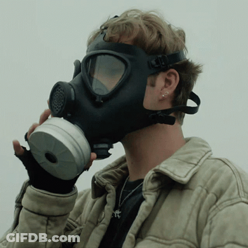Man Take Off Gas Mask GIF