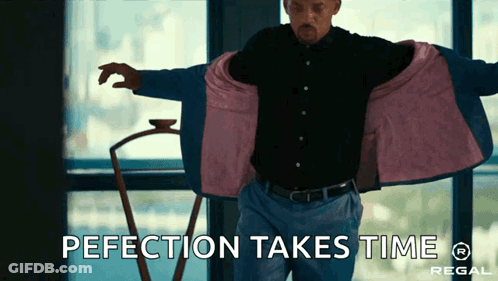 Man Taking Off Jacket Saying Perfection Takes Time GIF