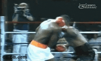 Man Taking Photo Of Boxers In Ring GIF