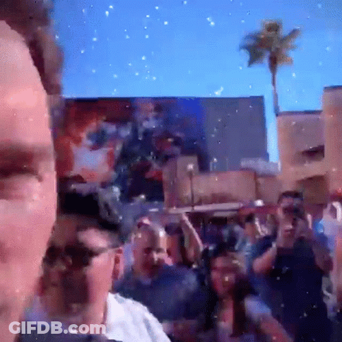 Man Taking Picture Of Crowd GIF