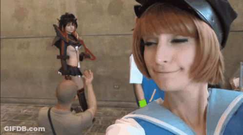 Man Taking Picture Of Girl In Cosplay GIF