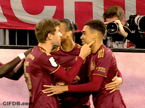 Man Taking Picture Of Soccer Players GIF