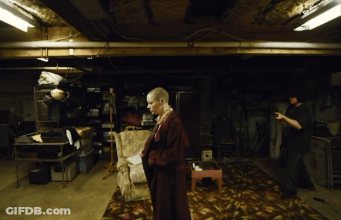 Man Taking Picture Of Woman In Red Robe GIF